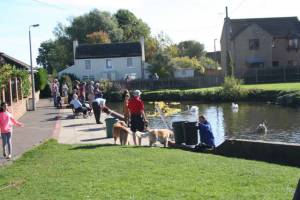 Spectators line the race route