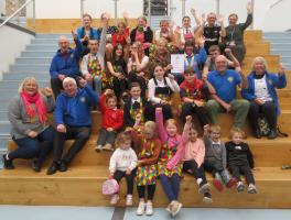 Robin Hamilton, President of Dunbar Rotary Club presents a cheque for £200 to Dunbar Scout Group Leader Matthew Bower accompanied by enthusiastic Beavers at their meeting last Thursday. 