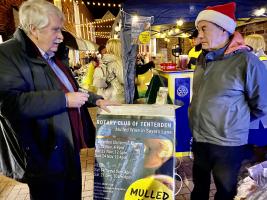 Handing over the Rotary Club crocus bulbs to Tenterden Wildlife for planting