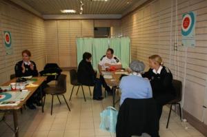 Jo Beaumont, Ben Shadbolt and Sam Beer St John's Ambulance members assessing shoppers blood pressure