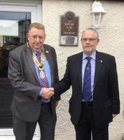 Immediate Past President Peter Strachan handing over to President Bryson Glass.