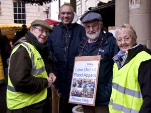 Wally Woolly, Norman Hore, David Goldsmith and Chris Woolly collecting in the Farmers Market.