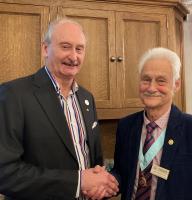 District Governor, Chris Brenchley, inducted new member Jefferson Peake.