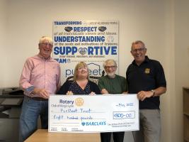 Cheque presentation to Ken Johnson and Paula Hall by Pip Rippengill and Michael Walker