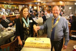 District Governor Heather and Club President Melvin cut the cake