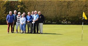 Maurice and the Winners on the Day gather on the 18th