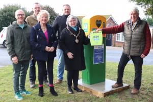 Seaford Rotary President Clive Livingstone handing over the defibrillator to Mayor of Seaford Councillor Sally Markwell with from the left David Bailey, Jim Stanford and Barbara Mine (Friends of Bishopstone Station) and Jesse Roberts