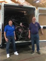 Jackie Wellman and Club President, John Cuthbertson, with the latest bike collection