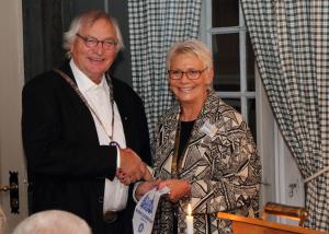 Jean being welcomed to Norway and presenting our Club Pennant