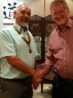 Jerry Noble receiving the president's chain of office from Trevor Clarke