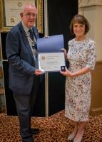 President Neil Dodgson of the Rotary Club of Wakefield Chantry presenting Jill Brookling with the Paul Harris Fellow Award for her work over a number of years in Charity fundraising