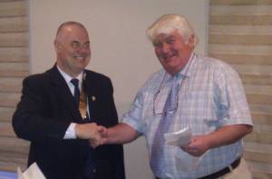 President George welcomes John Taylor to the Club once again