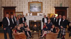 Picture shows the Thornhill and District group with vice-president Ian Morrison and his wife Margaret on the left side of the fireplace with President Gordon Steele and his wife Caroline on the right side of the fireplace.  
