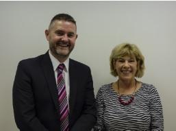 Rector Kevin O'Connor with President Anne Sloan