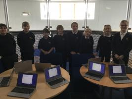 Pupils with some of the donated computers