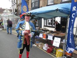 The Town Crier visiting the stall