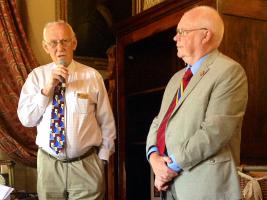 President David Gordon listens to John Neave's talk about LifeLine