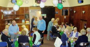 Guests enjoying coffee and cake