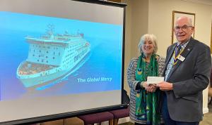 Knaresborough Rotary President David Kaye presenting a cheque for £350 to Mercy Ships representative, Jane Bradshaw.