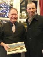 Michael Brendon shows his book to Wolfgang.