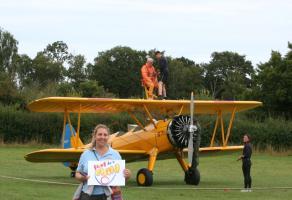 Myles takes part in a Wing Walk to raise funds for Just be a Child