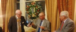 Neil Barratt from Penrith is inducted into Rotary by club president Charlie Shepherd at the Christmas party in the George Hotel