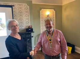 Shaun welcomes Pamela Baktis to the Rotary Club