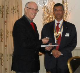 Nick Buraston being welcomed to the Club by President Hemant Amin