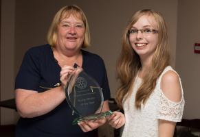 Nikita receives her lovely glass award from Immediate Past President Rtn Sue Mills