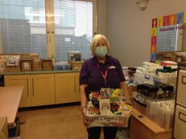 Rotarian Judith McMurray delivers the packs to patients at Ninewells Hospital.