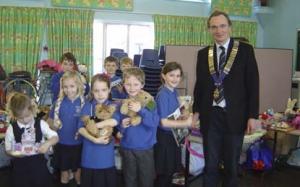 Isabelle's friends with James Lang, President of Windsor & Eton RC at the Oakfield School Bring & Buy