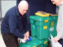 David Gordon sets up the Rotary stall featuring ShelterBox