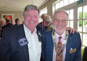 Milton Frary of the Wheelchair Foundation with Hastings Rotary club president Raymond Barrett.