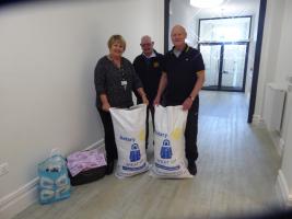 Donation of coats, bed linen and toiletries to the Foyer