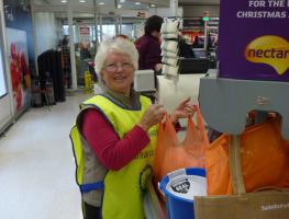 President Marie hard at work bag packing