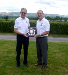 Rotarians Gwilym Williams and Eric Howells.  District 1180 Golf Champions