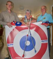 Photograph (a) (courtesy of Rotarian Mike Marshall) L-R: President Michael Keene, Anne Allison (Alzheimer Scotland) with Rotarian Gordon Lawson