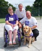 Stephanie & John Flower with Stephanie’s Canine Partners dog Elmo