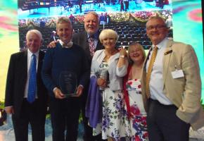 Recipient Clive Knowles and wife Tracy with the Judging Committee