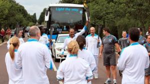 Club member and former President of the Dagenham Club Arun Patel leads the Para-Olympics Coach to the Olympic Stadium 