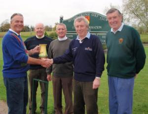 Terry presenting trophy to Colin watched by Colin B, Alan and Bob