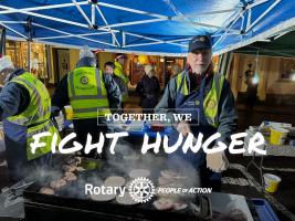 Selling Burgers to raise funds at Castle Cary Christmas Cracker 7 Dec 2023