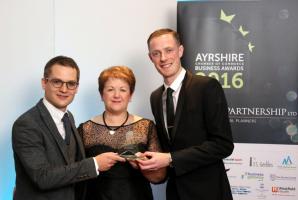 Alistair Duff and Peter Telfer being presented with their award - Outstanding Performing Business (under 50 employees) in October 2016