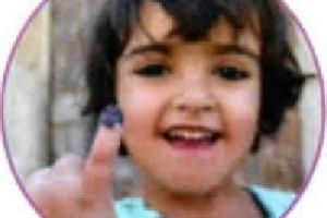 A purple finger celebrates having been immunised against Polio 