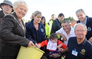 Our Rotary Club Secretary Geoff & others helping our Mayor to plant Crocus