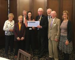 Presentation of cheque to In Harmony Liverpool