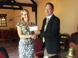 President Chris Whipps Presenting cheque to 'Nelson's Journey'