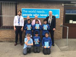 275 Dictionaries 4 Life Presented to Local Schools