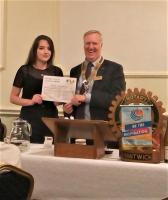 President Michael presenting Molly Humphries with her RYLA Certificate