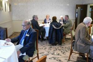 People seated at dining tables